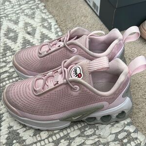 Nike Pink Sneakers with Mesh Upper and Cushioning